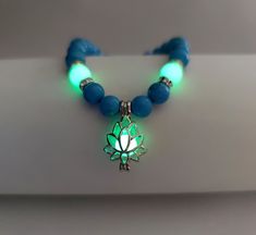 Fashion Element: Lotus Style: Europe and America Dark Bracelet, Glow Bracelets, Lotus Bracelet, Natural Stone Bracelets, The Glow, Healing Stone, Blue Bracelet, Green Stone, Turquoise Beads