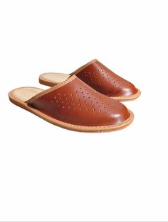 Comfortable Leather Shoes With Textured Sole, Brown Leather Clogs With Textured Sole, Brown Clogs With Stitched Sole, Comfortable Brown Clogs With Stitched Sole, Comfortable Leather Shoes With Textured Sole And Closed Toe, Brown Slippers With Rubber Sole And Plain Toe, Brown Plain Toe Slippers With Leather Sole, Brown Textured Sole Slip-on Slippers, Comfortable Leather Slippers