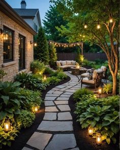 an outdoor patio with lights and landscaping