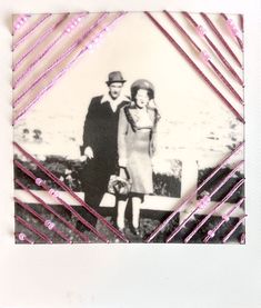 an old black and white photo with pink strips on the edges shows a man and woman standing next to each other