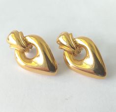 Vintage gold plated teardrop shape clip on earrings with open work. Great condition with shiny polish with comfy ear clips. Hallmarked Made in USA. Size: 1 1/8" x 3/4"  Thank you for visiting our shop! Please refer to photos as part of the description. Please Check out FAQs and Shop Policies and our other items on our home page at https://vintagebytiffinie.etsy.com SHIPPING: We combine shipping if your items can be packed safely together. All purchases over $100.00 ships with signature confirmation. Please contact us with any further questions. We are delighted you found our shop. Luxury Tarnish-resistant Gold-plated Clip-on Earrings, Luxury Gold Plated Tarnish Resistant Clip-on Earrings, Luxury Gold-tone Brass Clip-on Earrings, Luxury Yellow Gold Teardrop Clip-on Earrings, Luxury Gold Plated Statement Clip-on Earrings, Update Closet, Mens Diamond Jewelry, Bling Ring, Ear Clips