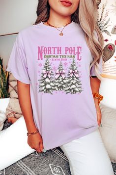 You will love this adorable Coquette Christmas design on the popular Custom Colors Tshirt! Whether you are heading to the Christmas tree farm, or holiday shopping, or a festive party - you will feel so cozy and cute in this tee! Sizing is unisex and runs true to size. We have included a sizing chart in the photos for your convenience. To use the sizing chart, take one of your favorite t-shirts, lay it on a flat surface, measure it and compare to the chart. Thank you for supporting my small business! Cute Winter T-shirt With Graphic Print, Cute Holiday T-shirt For Winter, Cute Winter Holiday T-shirt, Cute Holiday T-shirt With Short Sleeves, Cute Pink Christmas T-shirt, Cute Winter Graphic Print T-shirt, Cute Holiday Graphic Print Tops, Cute Short Sleeve T-shirt For Winter, Christmas Pink T-shirt With Letter Print