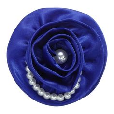 a blue flower with pearls on it