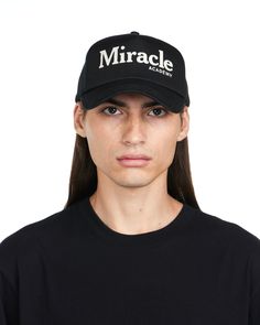 BLACK HAT WITH VINTAGE MIRACLE ACADEMY MOTIF ON FRONT 100% COTTON VINTAGE MIRACLE ACADEMY MOTIF EMBROIDERED ON FRONT ADJUSTABLE SNAP CLOSURE ONE SIZE FITS MOST Black Hat With Embroidered Logo And Curved Visor, Classic Black Hat With Letter Print, Vintage Black Baseball Cap With Letter Print, Classic Black Trucker Hat For Streetwear, Black Hat With Letter Print And Curved Visor, Black Hat With Embroidered Logo And Short Brim, Black Hat With Embroidered Logo And Curved Brim, Black Hat With Embroidered Logo And Flat Brim, Black Baseball Cap With Letter Print And Curved Brim