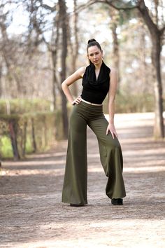 "Maxi wide leg palazzo pants, made from organic cotton ponte roma. Fabric thick and warm, but also god for warm weather. This fabric makes the pants have a perfect fall. Due to this fabric, they are very versatile pants, they can be used for formal events, such as doing yoga, dancing, or simply wearing them every day. SIZE CHART SIZE XS Bust:   31\"-33\"  //   78-83cm Waist: 24\"-25\"  //60-65cm Hips: 34\"-35\"  //  84-87cm SIZE S Bust: 33\"- 35\"  //  83-88cm Waist:26\"-27\" //  66-70cm Hips: 3 Fitted Wide-leg Cotton Yoga Pants, Stretch Wide-leg Harem Pants For Fall, Fitted Cotton Wide-leg Culottes, Fitted Wide Leg Cotton Culottes, Fitted Cotton Wide Leg Culottes, Stretch Wide Leg Yoga Pants, Green Flare Pants, Festival Bottoms, Pixie Clothing