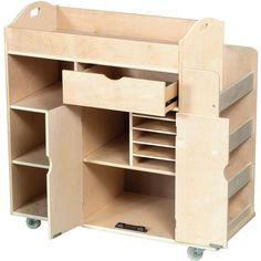 a wooden toy storage unit with drawers and wheels on the bottom shelf, open to reveal compartments