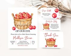 an apple themed baby shower is shown with apples in a basket and thank you notes