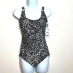 Nwt Calvin Klein Swim Suit Black + White Animal Print Ruching Size 8 Adjustable Straps. One Piece. Mid Section Ruching. Brand New With Tags And Hygienic Liner Condition. Measures 29" Around At Rest Bustline And 15" On Side Seam From Underarm To Top Of Leg Opening. I Pack Carefully And Ship Quickly. Have Any Questions? Please Ask. Thank You For Looking! Casual Calvin Klein Swimwear For Beach, Calvin Klein Black Swimwear For Beach, Fitted Black Calvin Klein Swimwear, Calvin Klein Swimsuit, Calvin Klein Lingerie, Halter Top Bathing Suits, Calvin Klein One, Calvin Klein Swimwear, Flattering Swimsuits