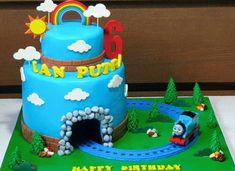 a thomas the train birthday cake on a table