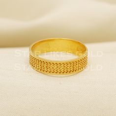 This handcrafted gold ring is designed to be both timeless and versatile. With its sleek lines and polished finish, it adds a touch of sophistication to any outfit. Perfect for daily wear or special occasions, it's a true staple for any jewelry collection. 22k Gold  Ring Metal is Real Gold Purity is 22kt  Weight is 4.71 grams approx Ring Size is 9.25 US  Max width is 0.5 cm approx ,  Please feel free to ask if you have any query. Return and cancellation-  a 20% restocking fees will be deducted f 22k Gold Ring, Minimalist Gifts, 22k Gold, Gold Style, Metal Rings, Gold Bands, Rings Statement, Band Rings, Statement Rings