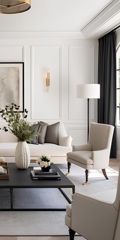 a living room filled with furniture and a large painting on the wall above the coffee table