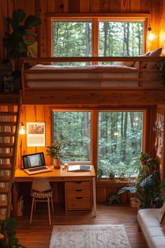 a loft bed sitting next to a desk in a room with wooden walls and flooring