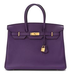 This is an authentic HERMES Togo Birkin 35 in Ultraviolet. This chic and iconic handbag is expertly handcrafted of luxurious togo calfskin leather in purple. The bag features rolled leather top handles, and a short front flap, secured with a strap and a palladium silver plated turn-lock closure. This opens to a matching purple matte chevre goatskin leather interior with zipper and patch pockets. Purple Birkin Bag, Modern Togo Leather Travel Bag, Luxury Togo Leather Office Bag, Designer Purple Bag With Gold-tone Hardware, Designer Purple Bags With Gold-tone Hardware, Elegant Togo Leather Bags For Everyday Use, Luxury Togo Leather Travel Bag, Luxury Rectangular Togo Leather Bag, Designer Togo Leather Top Handle Bag