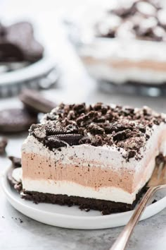 two pieces of cake sitting on top of a glass plate