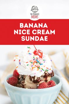 banana nice cream sundae with whipped cream and raspberries in a blue bowl