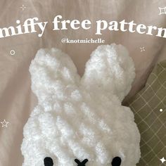 a white stuffed animal sitting on top of a bed next to a pillow with the caption, amimmy free pattern