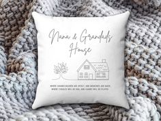 a white pillow with the words mama and grandad's house on it