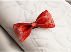 Elevate your groom or best man's attire with our intricately designed Red Asian Chinese Wedding Bow Tie, featuring a motif of oriental florals and the symbol of double happiness in the center. Our bow tie adds a traditional touch to your special day, showcasing elegance and sophistication. Elegant Red Bow For Gift, Elegant Red Bow With Butterfly Knot, Elegant Red Bow Tie For Groom, Red Satin Bow Tie For Wedding, Red Satin Wedding Bow Tie, Red Bow Tie With Butterfly Knot For Gift, Red Bow Tie For Wedding, Double Happiness Wedding, Double Happiness Symbol