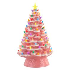 a pink cupcake christmas tree with multicolored sprinkles on it