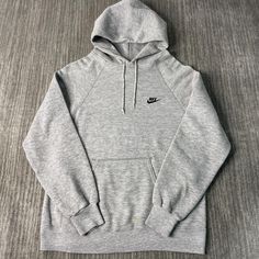 Vintage 90s Nike Swoosh Check Logo Sportswear Athletic Made in USA Streetwear Grey Graphic Hoodie Large Mens Condition:  Excellent Used Condition  = No Flaws Measurements: Please see photos above for all measurements IF YOU BUY TWO OR MORE ITEMS USE THE CODE BUNDLE @ CHECK TO SAVE 20% WE SHIP WITHIN 24 HOURS AFTER PURCHASE! Please be aware that we do not offer free returns!! The Buyer is responsible for the cost of the return label. Follow us on TikTok & Instagram @findsnostalgic and tag us in y Casual Hooded Sweatshirt For Sports, Casual Sports Hoodie With Kangaroo Pocket, Casual Hooded Hoodie For Sports, Casual Hooded Sweatshirt For Gym, Sports Sweatshirt With Kangaroo Pocket, Sports Long Sleeve Sweats With Kangaroo Pocket, Sports Sweats With Kangaroo Pocket And Long Sleeve, Casual Sports Sweats With Hoodie, Casual Sports Hoodie Sweats