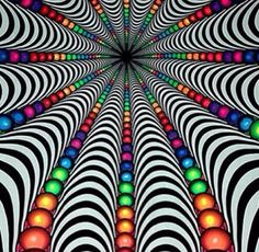 an optical illusional image with balls and lines in the center, as if it were moving