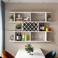 a dining room table with wine bottles and glasses on the shelves above it, along with two chairs