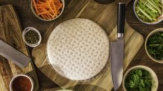 the cutting board has several different types of vegetables on it