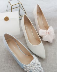 Oversized Pearl Appliqué, Plain, or with a Satin Bow. How do you like our new Haylee Pumps? . . . #shopkaileep #womenshoes #bridalshoes #weddingshoes #sparklyshoes #womenshoes #flats #weddingshoes #bridalshoes #weddingstyle #weddingidea #shoestagram #bridalinspo #bridalstyle #shoeslover #shoeshopping #shoeslovers #loveshoes #shoeswag #iloveshoes #shoefie #instashoes #bridalfashion #shoesaddict #shoeaddict #shoeselfie #bridesessentials #ivoryshoes #bridesmaid Feminine Wedding Flats, Elegant Spring Heels For Bridesmaids, Spring Wedding Court Shoes With Almond Toe, Spring Wedding Low Heel Kitten Heels, Elegant Low Heel Bridesmaid Heels, White Satin Bow Wedding Shoes For Bridesmaids, Spring Wedding Heels With Satin Bow, Spring Wedding Kitten Heels With Almond Toe, Spring Wedding Almond Toe Kitten Heels