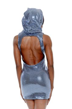 The Lila Sequin Dress is a metallic statement designed to turn heads. It features an asymmetric design with pleats gathered on the shoulder and the waist for a flattering fit. An open back encapsulates sensual sophistication with a draped hood and a soft jersey lining for comfort. Shell: 51% Nylon; 35% Polyester; 8% Lurex; 6% Spandex Lining: 95% Rayon; 5% Spandex Asymmetric drape detailing Fitted silhouette with stretch Short length Dry clean only Made in the United States Size and fit: Model is Glamorous Blue V-neck Mini Dress, Luxury V-neck Sequin Mini Dress, Metallic V-neck Chic Mini Dress, Silver Embellished V-neck Mini Dress, Purple V-neck Mini Dress With Sequins, Form Fitting Clothes, Blue Sequin Dress, Lilac Dress, Stretch Shorts