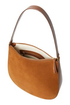 Large hobo bag in suede — a warm, nutty brown — with tonal vachetta leather trim. Features a full lining, zipper closure, and interior zippered pocket and slip pocket. Dimensions: W: 13" X D: 3.5" X H: 12" 10.5" Strap Drop 100% Bovine Leather Suede is delicate. It should be kept away from water and stored in a dust bag to avoid matting. Style#: Bowen-SVA ** This item is subject to a $10 flat rate shipping charge; for standard shipping Chic Leather Hobo Bag With Suede Lining, Elegant Brown Hobo Bag With Suede Lining, Luxury Everyday Hobo Bag With Suede Lining, Elegant Leather Hobo Bag With Suede Lining, Brown Suede Top Handle Hobo Bag, Elegant Hobo Bag With Suede Lining, Elegant Suede Lined Hobo Shoulder Bag, Elegant Hobo Shoulder Bag With Suede Lining, Elegant Hobo Bag With Suede Lining For Everyday Use