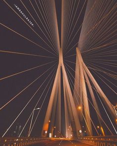 an image of a bridge at night with the words, i am not sure what this is