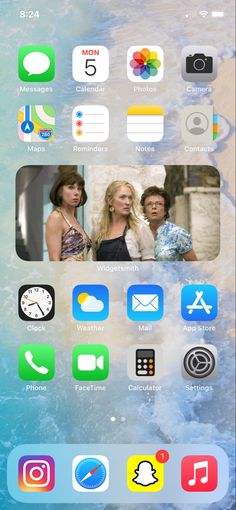 an iphone with the home screen open and icons displayed on it, including two people