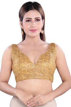 Product Features: Color: Gold Fabric: Net Pattern: Padded Sleeve: Sleeveless Neck Type: Sweatheart Neck Opening: Back Open Disclaimer: Tassel can very according to stock availability and Also there will be slight difference in digital to actual image Golden Saree Blouse Designs, Golden Blouse Design, Golden Blouse Designs, Gold Blouse Designs, Gold Lace Fabric, Brocade Blouse Designs, Golden Blouse, Net Pattern, Saree Blouses Online