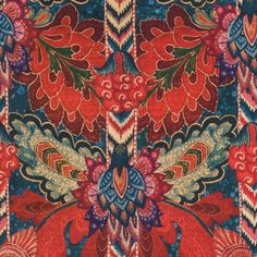 an intricately designed red and blue fabric