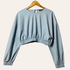 Zara Neoprene Effect Sweatshirt Blue Long Sleeve Elastic Hem Crop Top Keyhole Back Size-Women’s Us S Measurements (Approx.) Length-15.5" Shoulder-Shoulder-24.5" Pit-Pit-20" Sleeve-19.5" -77% Nylon, 33% Elastane -Condition -Nwt Ts-2164 - Date Night, Business Casual, Party, Club Wear, Feminine, Trendy, Oversized, Athleisure, Workout Light Blue Crew Neck Blouse, Trendy Blue Long Sleeve Top For Fall, Blue Crew Neck Long Sleeve Top For Spring, Blue Long Sleeve Top With Crew Neck For Spring, Casual Long Sleeve Crop Top, Blue Long Sleeve Crew Neck Top For Spring, Casual Long Sleeve Crop Top For Day Out, Casual Blue Crop Top For Fall, Blue Stretch Blouse With Crew Neck