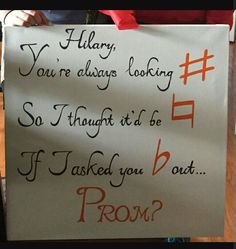 a woman holding up a sign that says sorry you're always looking so though it be if i asked you out prom