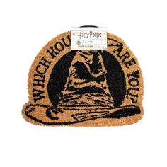 harry potter door mat with hogwart's house on it