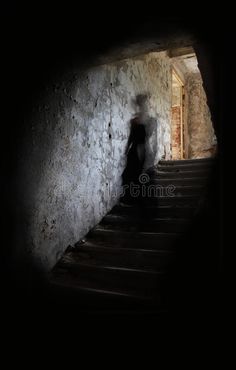 a person walking up some stairs in the dark royalty images and clippings are available for