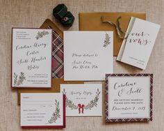 the wedding stationery is laid out on top of each other, including cards and envelopes