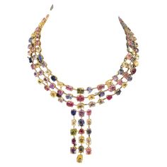 Multi-Colored Sapphire Necklace Features 142 sapphires in a variety of colors totaling 137.40 cts 18K Yellow Gold Measurements: 18 inches long Multi Sapphire Necklace, Multi Colored Jewelry, Heart Shaped Diamond Necklace, Goth Wardrobe, Pink Gold Necklace, Colored Jewelry, Lily Necklace, Tiaras Jewellery, Sapphire And Diamond Earrings