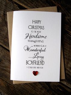 a christmas card with the words, happy christmas and some kind of heart on it