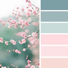 the color scheme is pink, blue and green with white flowers on it's branches