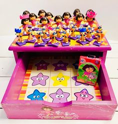 Solid wooden Dora the Explorer checkers playing cards 2006 set. Drawer opens for storage of pieces.  NOTE: set is NOT complete and has signs of wear due to age. Please see pictures for included parts and markings and wear.  Includes 12 Dora figures game pieces and 3 pink crowns. Also includes 12 Swipers the fox pieces and 2 blue crowns. Brand new Nickelodeon 2005 playing cards by Bicycle Pink Minnie Mouse Sets For Playtime, 2000s Board Games, Dora The Explorer Toys, Playful Minnie Mouse Playtime Sets, Dora The Explorer Ultra Blind, Checkers Game, Pink Crown, Blue Crown, Dora The Explorer