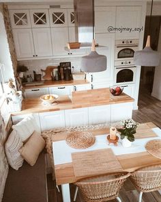 the kitchen is clean and ready to be used as a dining room or breakfast nook