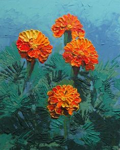 three orange flowers on a blue background