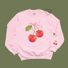 pretty please? with a cherry on top? 🍒 Details:✦ 50% Polyester, 50% Cotton✦ Gildan Light Fleece Crewneck✦ Long Sleeves✦ Unisex Sizing✦ Pre-Shrunk  Please note that colors may look slightly different in person due to lighting and monitor settings!  Apparel is made to order and for this reason returns/exchanges are not accepted. Spring Pink Tops With Cherry Print, Pink Cherry Print Top For Spring, Soft Coquette, Cherry Shirt, Bow Coquette, Coquette Girl, Pretty Please, Cherry On Top, Cute Sweaters