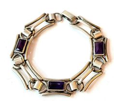 Vintage Art Deco Purple Stone Bracelet Sterling Silver Amethyst Glass Link Bracelet 1930s Antique Estate Jewelry Gift for Women Offered is an antique Art Deco sterling silver bracelet set with emerald cut purple amethyst glass stones. Marks: "K&B Sterling" Age: 1920s-1930s Measurements: 7 inches long Condition: It is in overall very good condition, consistent with age. Items are vintage or antique and may have slight signs of gentle use as would be expected. Silver and silver plated items are ha Magnified Images, Bracelet Set Silver, Art Deco Bracelet, Purple Stones, Art Deco Jewelry, Vintage Bracelets, Antique Art, Stone Bracelet, Vintage Art Deco