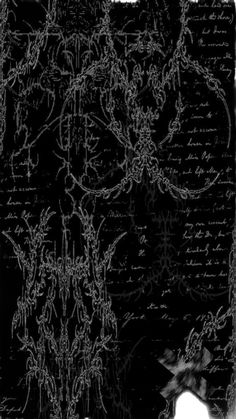 an old black paper with writing on it