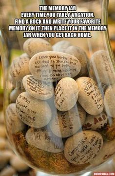 a jar filled with lots of rocks covered in writing