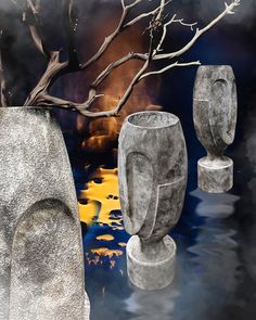 three stone vases sitting next to each other in front of a body of water